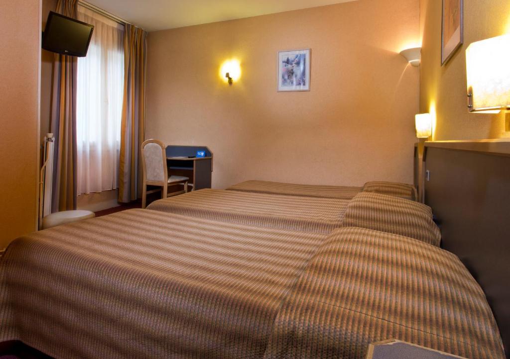 Hotel La Parizienne Ruang foto